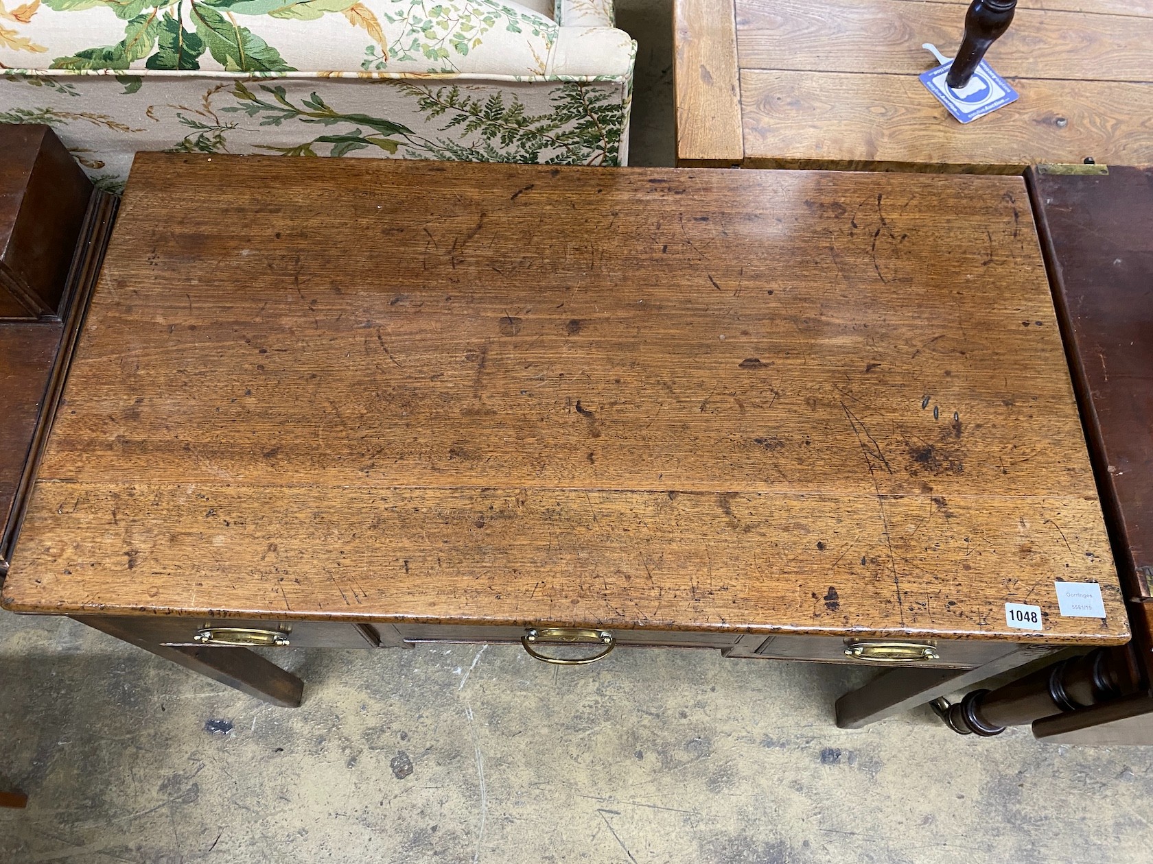 A George III and later mahogany kneehole table, length 183cm, width 53cm, height 75cm